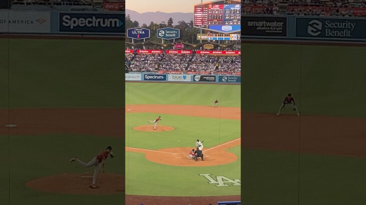 Shohei Ohtani batting while a kid in the crowd sings him a song he wrote for him.