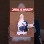 Shohei Ohtani goes down with an apparent shoulder injury