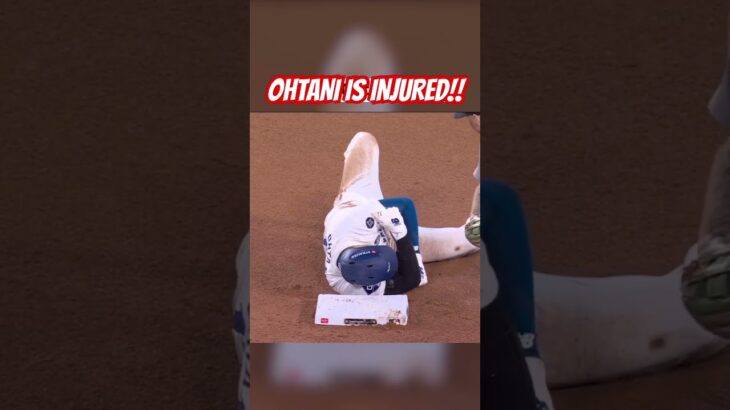 Shohei Ohtani goes down with an apparent shoulder injury