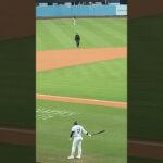 Shohei Ohtani warming up and timing the pitchers pitches in order to make some more history.